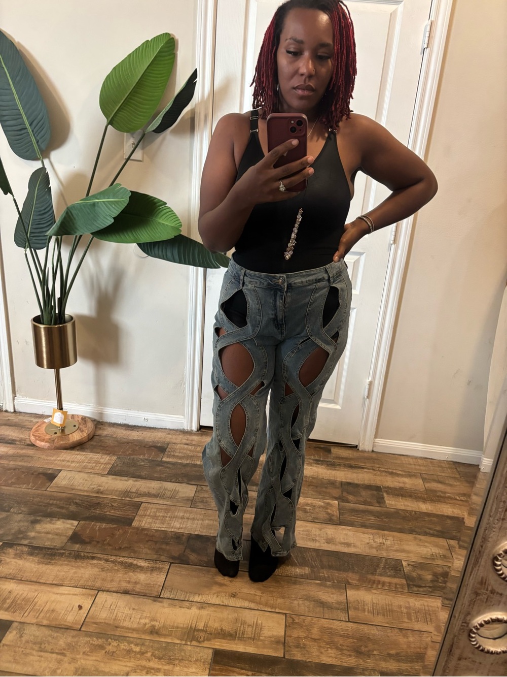 Women’s Black Bodysuit and Distressed Blue Cutout Jeans Set